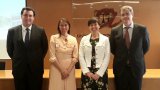 Photo of the selection committee with the candidate